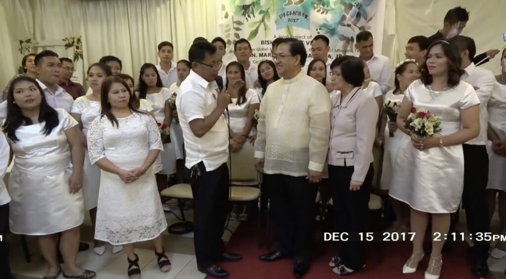 Brgy. E. Rodriguez Mass Wedding December 15, 2017, Tramway Garden Buffet Quezon City. Couples exchange vows at the Brgy. E. Rodriguez Mass Wedding led by Bishop Dante Veluz.